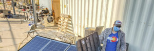 TSL intern with solar-panel trailer